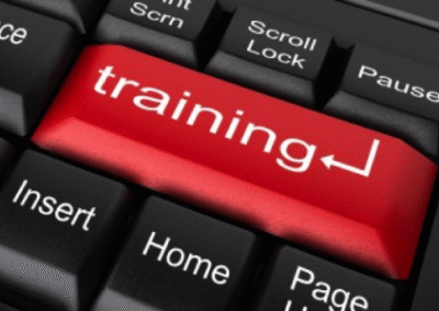 Red training key on a black keyboard.